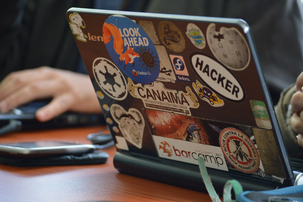 Hacker Laptop Covered in Stickers